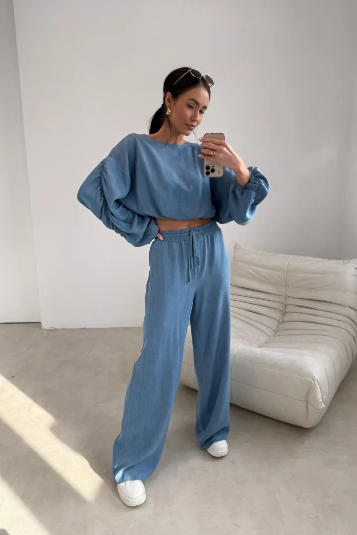 Emmy – szerokie spodnie z elastyczną talią i wiązaniem | Roco Fashion