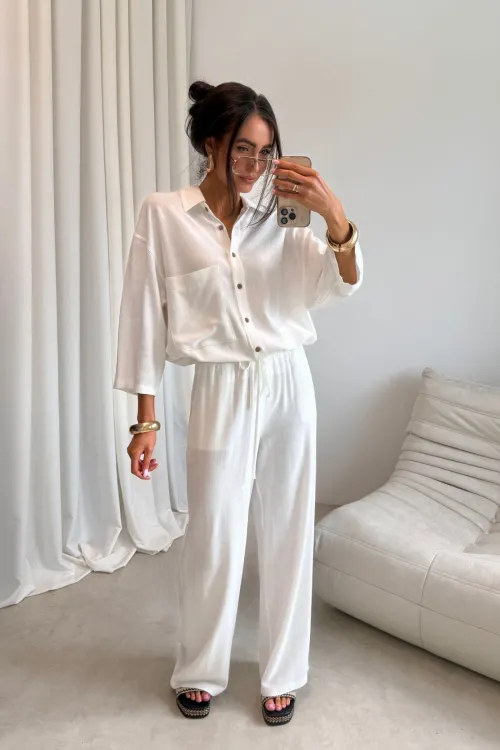 Malmo - szerokie spodnie z gumką w pasie i wiązaniem ecru| Roco Fashion